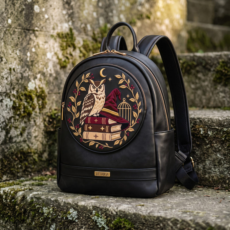 The Night Post embroidered leather backpack — full view